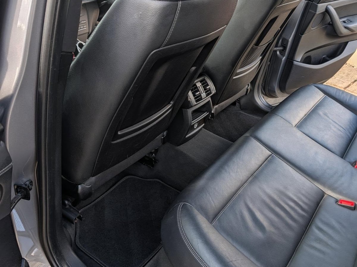 Clean black leather rear car interior